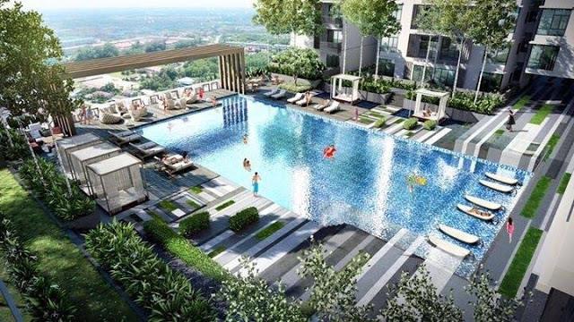 Bể bơi ngoài trời và khu tắm nắng chung cư GoldSeason nhìn từ trên cao