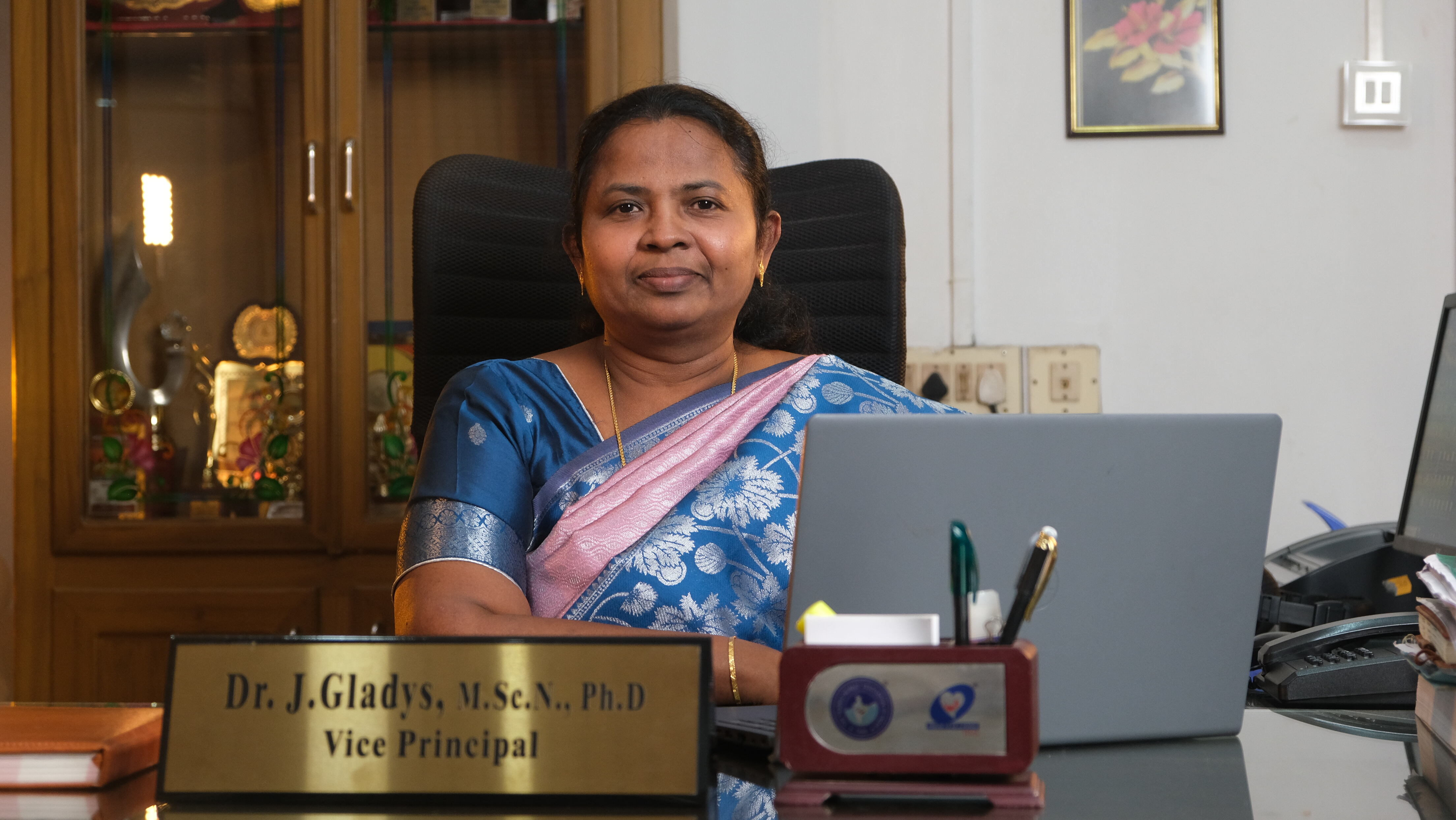 Dr. J Gladys